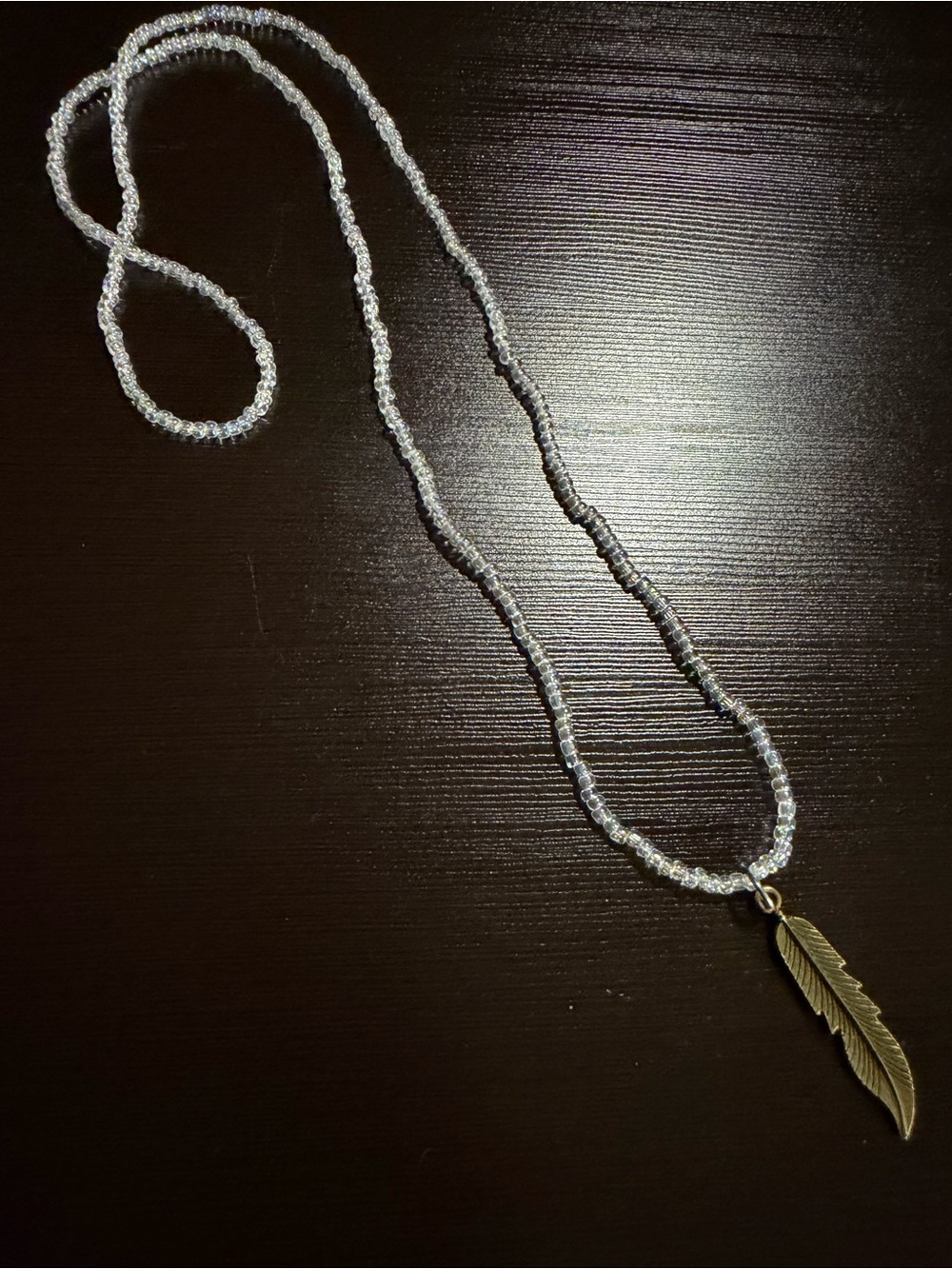 Clear Bead Necklace with Feather Pendant